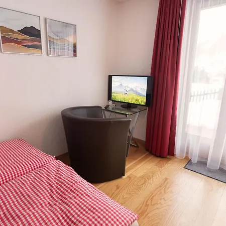 Mom - Alpine Boutique Apartments, Chalet Fagus, Terrace Studio Grindelwald